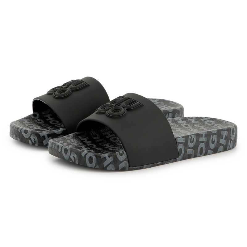 Leichte Pantoletten mit Badges HUGO 
                        JUNGE