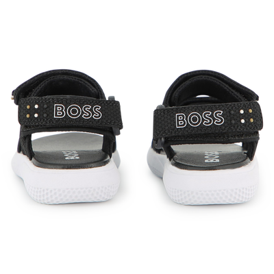 K&Uuml;NSTLICHE SANDALEN BOSS JUNGE