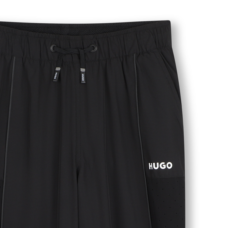 SPORTANZUG HUGO 
                        JUNGE