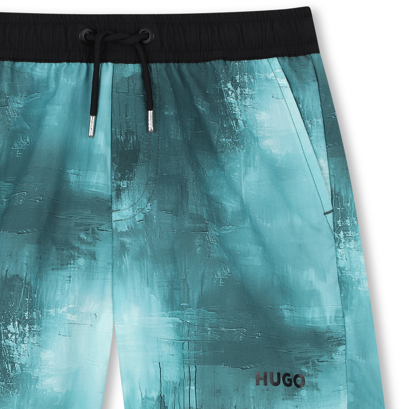 Surfen mit straffenden Schn&uuml;rsenkeln HUGO 
                        JUNGE