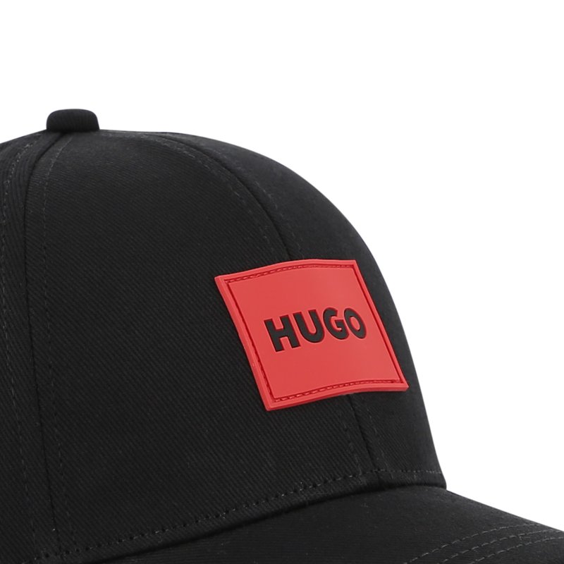 VERSTELLBARE KAPPE HUGO 
                        UNISEX